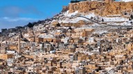 Mardin kar yağışından sonra beyaza bürünmesiyle havadan görüntülendi. Bakanlar bu mükemmel şehre bir daha hayran kaldı