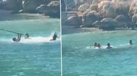 Mersin'de deniz ortasında sopalı kavga: O anlar kamerada