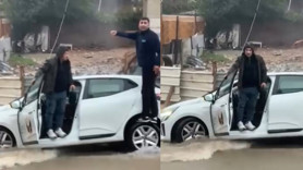 Yol çöktü, otomobil çukura saplandı! Sultanbeyli'deki mücadele kameraya yansıdı