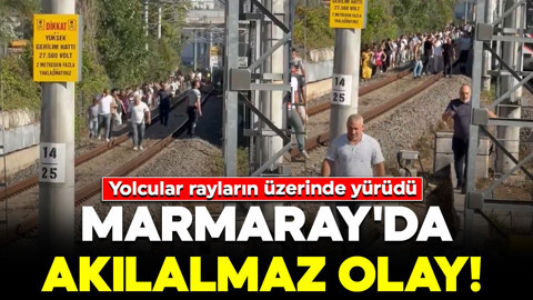 Marmaray'da akılalmaz olay! Yolcular rayların üzerinde yürüdü