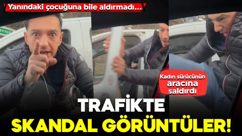 Trafikte skandal görüntüler! Yanındaki çocuğuna bile aldırmadı... Kadın sürücünün aracına saldırdı
