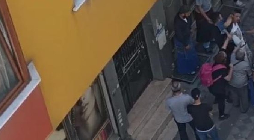 Eşine şiddet uygulayan adama pazarcılar müdahale etti