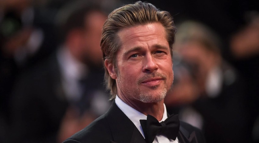 Brad Pitt'in kırmızı halı tarzı şoke etti! Diz üstü eteği sosyal medyada gündem oldu