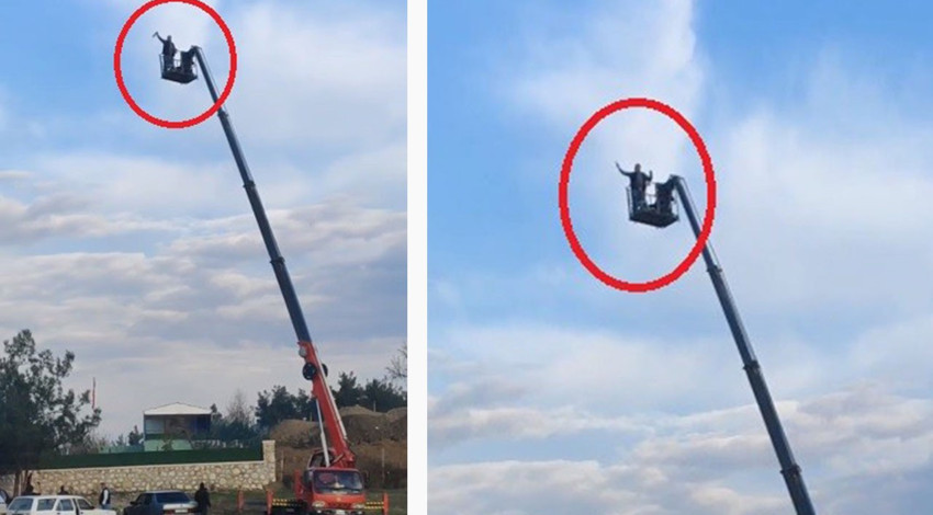 10 metrelik vincin tepesinde yaşanılanları gören vatandaşlar adama tepki yağdırdı