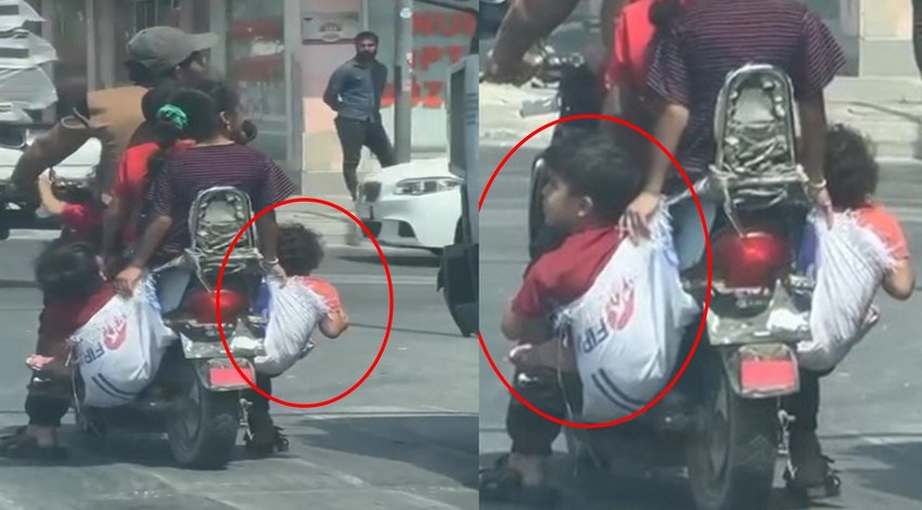 Trafikte tehlikeli yolculuk: 6 kişinin bindiği motosiklette çocuklar çuvalla taşındı! Görenler şok geçirdi