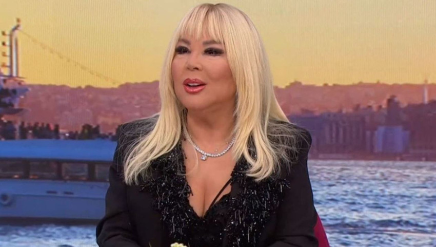 Safiye Soyman evinin kapısına gelen yaban domuzunu elleriyle besledi! - Resim : 1