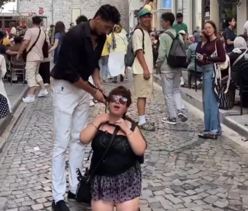 Kadına tasma takıp sokakta gezdirmişti! Olay yaratan görüntü sonrası böyle tutuklandılar - Resim : 1