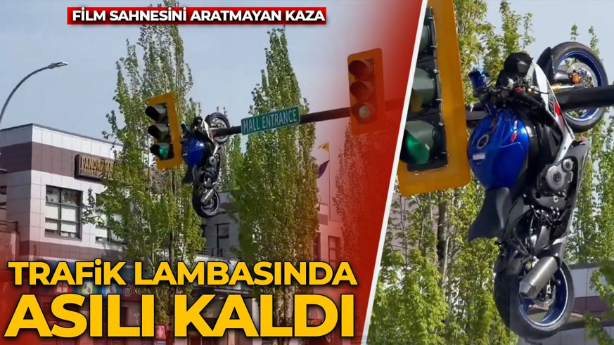 Film sahnesini aratmayan kaza: Motosiklet trafik lambasında asılı kaldı